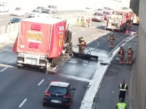 The Décarie Expressway is shut down in both directions between the Queen-Mary and Côte St-Luc exits because of a collision that caused a car to be set ablaze, Tuesday July 12, 2016.