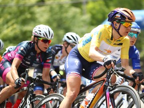 Megan Guarnier of the Boels-Dolmans Cycling Team in the yellow leader's jersey rides in the peloton during stage four of the Amgen Breakaway From Heart Disease Women's Race on May 22, 2016 in Sacramento, California.