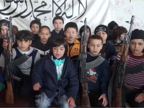 A framegrab from the The Glorious Cubs of the Caliphate video. Children have been recruited by ISIS.