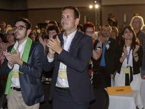Alexandre Cloutier, centre, at the Parti Québécois meeting for riding presidents May 29 in Drummondville. The leadership candidate recently wished Muslims well on Eid al-Fitr, sparking criticism from rival candidate Jean-François Lisée.