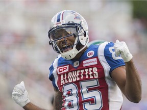 Alouettes' B.J. Cunningham celebrates after scoring a touchdown during first half CFL football action against the Saskatchewan Roughriders in Montreal on Friday, July 29, 2016.