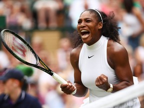 Serena Williams celebrates after winning a point against Angelique Kerber of Germany during the women's final at Wimbledon on July 9, 2016.