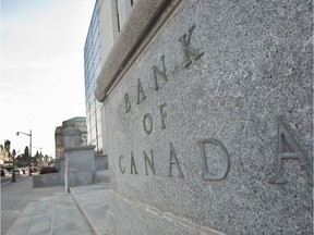 (FILES)The Bank of Canada building in Ottawa on April 12, 2011. Canada's central bank held its key lending rate at one percent on January 23, 2013, warning that the global economic outlook is "slightly weaker" than previously forecast. The Bank of Canada said the situation was improving in the United States and China, but said Europe remains in recession "with a somewhat more protracted downturn now expected" and major emerging economies are slowing further.
