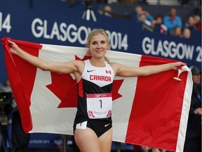 Canada's Brianne Theisen-Eaton celebrates after winning the heptathlon at Hampden Park Stadium during the Commonwealth Games 2014 in Glasgow, Scotland, on July 30, 2014. Brianne Theisen-Eaton's goal this summer is an Olympic gold medal.