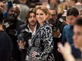 Canadian singer Celine Dion poses for photographers before Giambattista Valli's fall-winter 2016-2017 Haute Couture fashion collection, presented in Paris, France, Monday July 4, 2016.