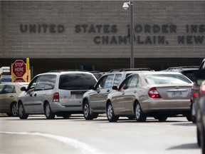 Cars entering the United States are lined up at the Lacolle-Champlain border crossing on Thursday September 21, 2006.