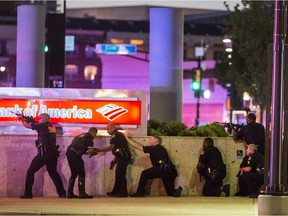 Dallas Police respond after shots were fired at a Black Lives Matter rally in downtown Dallas on Thursday, July 7, 2016. Dallas protestors rallied in the aftermath of the killing of Alton Sterling by police officers in Baton Rouge, La. and Philando Castile, who was killed by police less than 48 hours later in Minnesota.