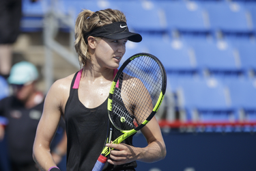 Canadian tennis player Eugenie Bouchard pauses during a practice session ahead of the Rogers Cup Tennis Tournament at Uniprix Stadium in Montreal on Friday, July 22, 2016.