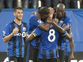 The Montreal Impact's Didier Drogba, second left, celebrates with teammates after scoring against the Philadelphia Union during first-half MLS soccer action in Montreal, Saturday, July 23, 2016.