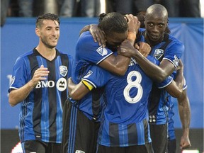 Montreal Impact's Didier Drogba, second left, celebrates with teammates after scoring against Philadelphia Union during first half MLS soccer action in Montreal, Saturday, July 23, 2016.