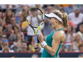 Eugenie Bouchard of Canada celebrates her victory over Dominika Cibulkova of Slovakia during second round of play at the Rogers Cup tennis tournament Wednesday July 27, 2016 in Montreal.