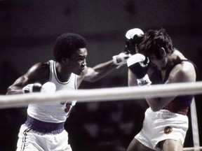 American boxer Sugar Ray Leonard, left, defeats East Germany's Ulrich Beyer at the 1976 Montreal Olympic Games.