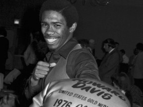 Howard Davis Jr., who won lightweight boxing gold at the 1976 Olympics, poses for photographers at a news conference in New York on Dec. 17, 1976. Davis was voted the outstanding boxer at Summer Games, out-polling such champions as Sugar Ray Leonard.