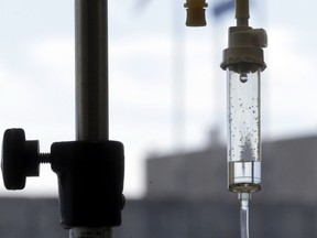 n this Sept. 5, 2013 file photo, an infusion drug to treat cancer is administered to a patient via intravenous drip at a cancer centre hospital in Durham, N.C.
