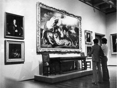 May 1976: Two men look at The Leopards by Peter Paul Rubens at the newly expanded Montreal Museum of Fine Arts. It was later discovered that the painting was not done by Rubens and it was removed from display.