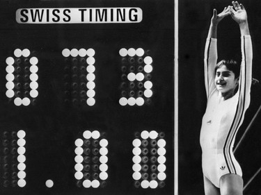 At the Montreal Olympics, Nadia Comaneci became the first gymnast in Olympic history to be awarded a perfect score: 10. But the crowd at the Montreal Forum took a moment to realize they had witnessed history on the uneven bars. That’s because the electronic scoreboard flashed 1.00. It was not equipped to reflect perfection.
