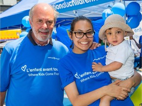 Paul Normandin, co-chair of the Pedal for Kids Committee of the Montreal Children's Hospital, and Anissa Abdel-Aal with her 21-month-old son Zayn, spokeschild for the fundraiser.