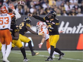 Hamilton Tiger-Cats quarterback Jeremiah Masoli throws a pass against the BC Lions during CFL football action at Tim Hortons Field in Hamilton on Friday, July 1, 2016.