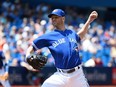 Toronto Blue Jays J.A. Happ works against the Baltimore Orioles during first inning MLB baseball action, in Toronto on Saturday, July 30, 2016.