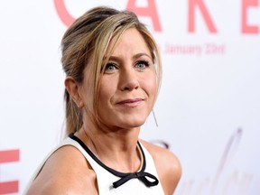 Women "are complete with or without a mate, with or without a child," Jennifer Aniston writes in a Huffington Post piece.