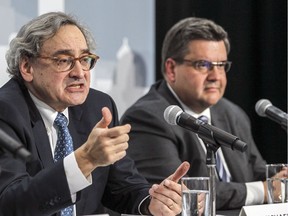 Michael Sabia, President and CEO of the Caisse de dépôt et placement du Québec, left, and Montreal Mayor Denis Coderre at press conference at the Caisse's headquarters in Montreal Friday April 22, 2016 to update public transit projects for the South Shore and West Island.