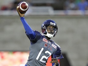 Montreal Alouettes then quarterback Rakeem Cato throws a pass  during the first half of the Canadian Football League game against the Hamilton Tiger-Cats in Montreal on Friday, July 15, 2016.