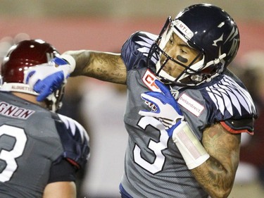 Alouettes quarterback Vernon Adams Jr. follows through on a pass during Canadian Football League game against the Hamilton Tiger-Cats in Montreal Friday, July 15, 2016.