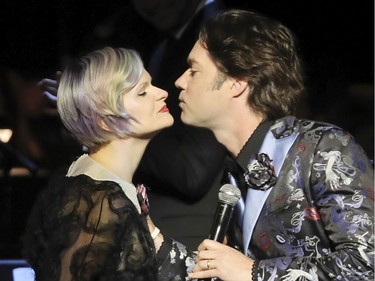 Rufus Wainwright and singer Kathryn Guthrie exchange a two-cheek kiss prior to the start of a performance of Wainwright's opera Prima Donna. This was part of the Montreal International Jazz Festival at Salle Wilfrid-Pelletier Saturday July 2, 2016.