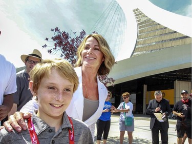 Nadia Comaneci visits the Olympic Park with her son Dylan to mark the 40th anniversary of the 1976 Olympic Games in Montreal on July 21, 2016.
