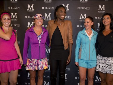 Venus Williams poses with members of the  tennis club wearing her new line of clothing, EleVen, in Montreal July 25, 2016.   (Christinne Muschi / MONTREAL GAZETTE)