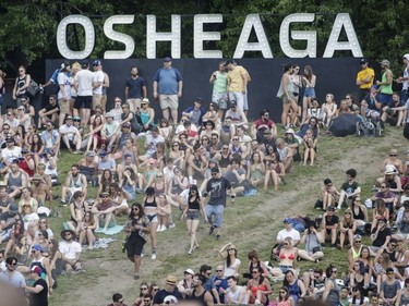 Crowds watch performances on Day One of the Osheaga Music and Arts Festival at Parc Jean-Drapeau in Montreal on Friday, July 29, 2016.