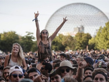 Music fans enjoy the performance by Canadian indie rock band Half Moon Run during Day One of the Osheaga Music and Arts Festival at Parc Jean-Drapeau in Montreal on Friday, July 29, 2016.