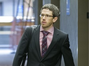 Psychiatrist Joel Watts arrives for the Richard Bain murder trial at the Montreal courthouse, Friday July 29, 2016. Watts is expected to testify during the trial about Bain's level of criminal responsibility.
