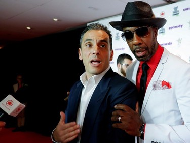 Sebastian Maniscalco, left, and JB Smoove clown around during the red carpet arrival for the Just For Laughs Awards Show in Montreal on Friday, July 29, 2016. Maniscalco won stand-up comedian of the year. Smoove hosted the awards show.