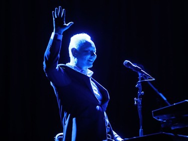 Joe Jackson waves at the crowd as he brings his eclectic mix of songs to the Montreal International Jazz Festival at Théâtre Maisonneuve of Place des Arts on Monday, July 4, 2016.