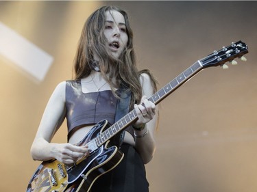 Alana Haim of the American rock band Haim performs on Day Two of the Osheaga Music and Arts Festival at Parc Jean-Drapeau in Montreal on Saturday, July 30, 2016.
