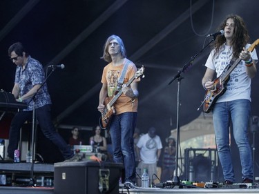American musician Kurt Vile, right, performs with his band Kurt Vile & The Violators on Day Two of the Osheaga Music and Arts Festival at Parc Jean-Drapeau in Montreal on Saturday, July 30, 2016.