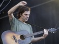 Brad Barr of the Canadian band Barr Brothers performs on Day Two of the Osheaga Music and Arts Festival at Parc Jean-Drapeau in Montreal on Saturday, July 30, 2016.