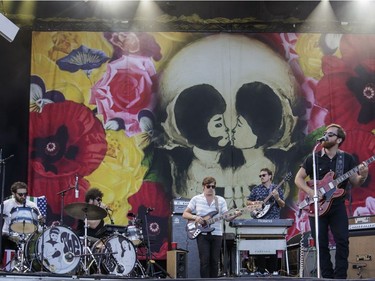 Dan Auerbach, right, of the American rock band The Arcs performs on Day Two of the Osheaga Music and Arts Festival at Parc Jean-Drapeau in Montreal on Saturday, July 30, 2016.