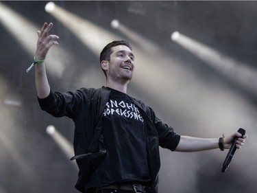 Dan Smith of British indie rock band Bastille performing on Day Two of the Osheaga Music and Arts Festival at Parc Jean-Drapeau on Saturday, July 30, 2016.