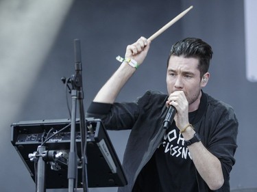 Dan Smith of British indie rock band Bastille performing on Day Two of the Osheaga Music and Arts Festival at Parc Jean-Drapeau on Saturday, July 30, 2016.