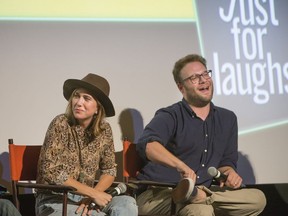 Kristen Wiig left, and Seth Rogen right, take part in a Q&A with other cast members of the movie Sausage Party after the screening at the Imperial Cinema as part of the Just for Laughs festival in Montreal, on Saturday, July 30, 2016.