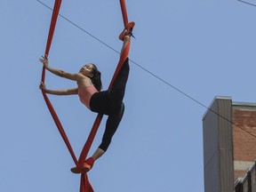 An artist performs an excerpt of the free outdoor circus show Fracas, as part of the Montréal Complètement Cirque festival, in Montreal on July 5, 2016.