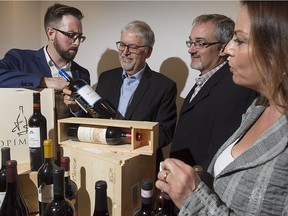 Members of the wine club Opimian Society with some of their products in Montreal on Wednesday July 6, 2016. From left: Alexandre Guay, Frank Ianni, , Patrick Bolduc and Anna Tarzia Zappia.