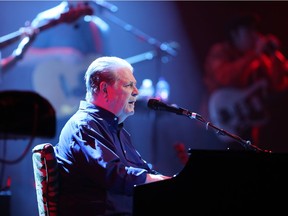 Brian Wilson of Beach Boys fame performs at the piano at Place des Arts as part of the Montreal International Jazz Festival July 7, 2016, with Al Jardine and Blondie Chaplin.