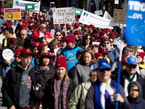 Thousands of people march through the streets on Montreal in support of mental health issues on Sunday October 4, 2015.