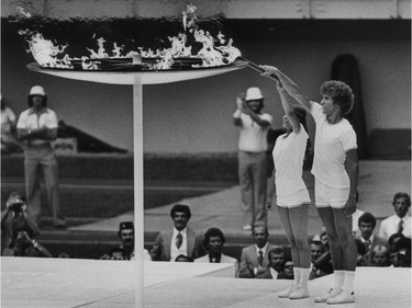 The Montreal Olympics marked the first time in Olympic history that a woman and a man carried the flame together. On July 17, 1976, Stéphane Préfontaine, a 15-year-old Montreal francophone, and Sandra Henderson, a 16-year-old Ontario anglophone, lit the Olympic urn in front of a Big O crowd of 73,000. ''The crowd exploded,” Préfontaine would say of the moment he and Henderson entered the stadium. “It's a good thing there was no roof on the stadium, because it would have blown off.” Four years later, the two were asked to deliver the official Olympic flag to the next host city, Moscow. Normally, then-mayor Jean Drapeau would have handed it off but he could not because Canada boycotted the Games over the Soviet Union invasion of Afghanistan.