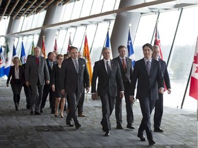 Prime Minister Justin Trudeau leads Canada's premiers to a news conference during the First Ministers Meeting in Vancouver, B.C., Thursday, March. 3, 2016. Interprovincial trade is likely to be a key topic when the first ministers meet in Whitehorse in late July.