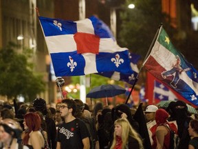 Protesters opposing Quebec student tuition fee hikes demonstrate in Montreal, Wednesday, August 1, 2012.