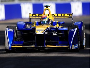 Renault e.Dams driver Sebastien Buemi of Switzerland drives his car during FIA Formula E race at Battersea Park, London, Sunday July 3, 2016.